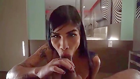 Busty brunette with a tattooed butt gets fucked in an amateur clip