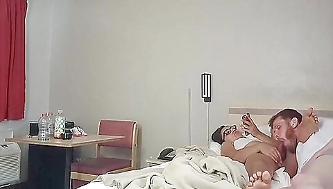 A brunette with big tits and a big ass gives a peek