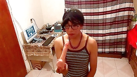 Brunette is playing with her big dildo in the pool