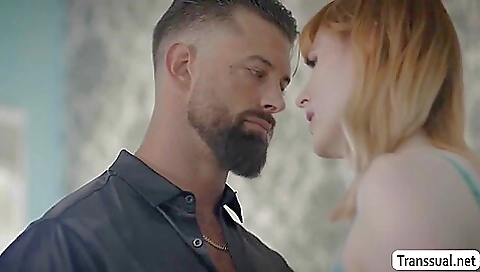 Red haired babe takes off her panties and puts a dildo in her anus