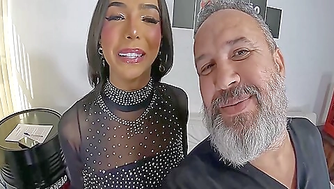 Brazilian milf with a tattoo on her ass spreads pussy