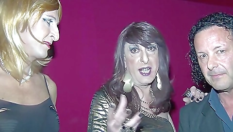 Anal fetish with a shemale in a high heels group sex scene