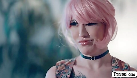 Blonde redhead in a tattooed ass is fucked from behind